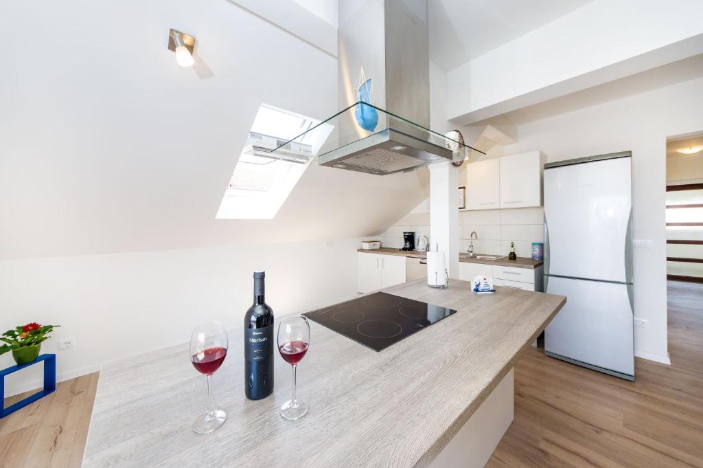 Kuchyňa alebo kuchynka v ubytovaní Apartman Iva Zara