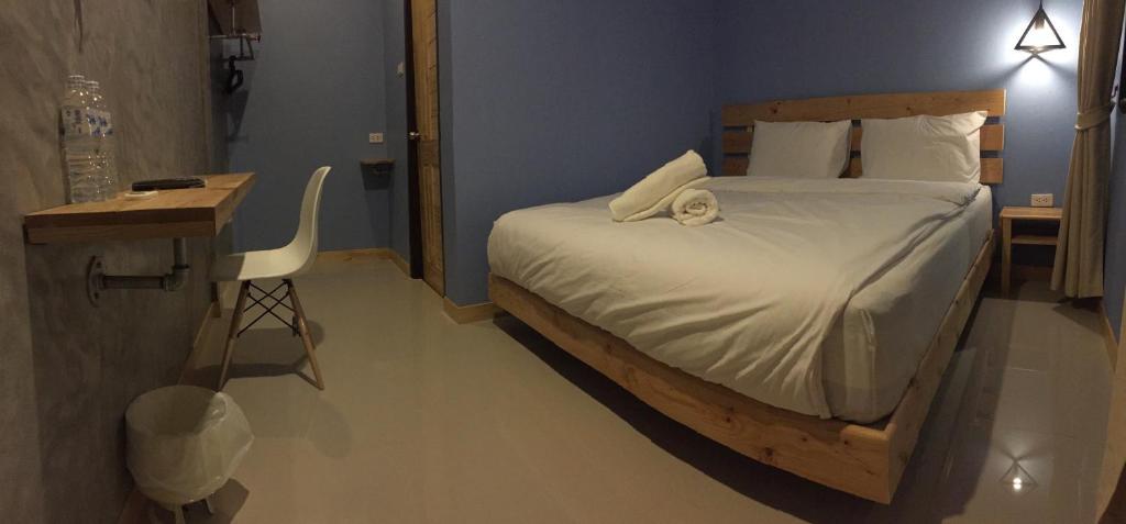 Postel nebo postele na pokoji v ubytování Rest Time Hotel