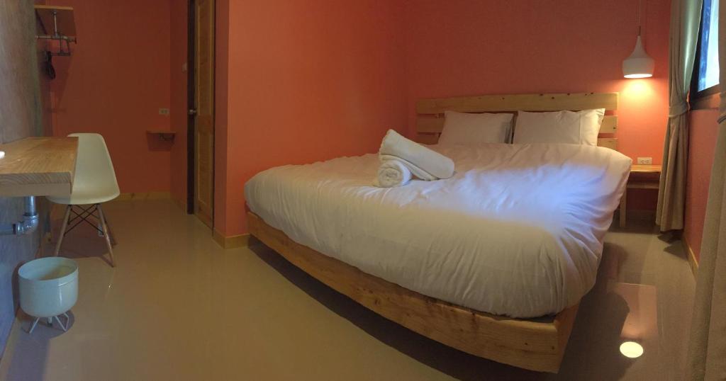 Postel nebo postele na pokoji v ubytování Rest Time Hotel