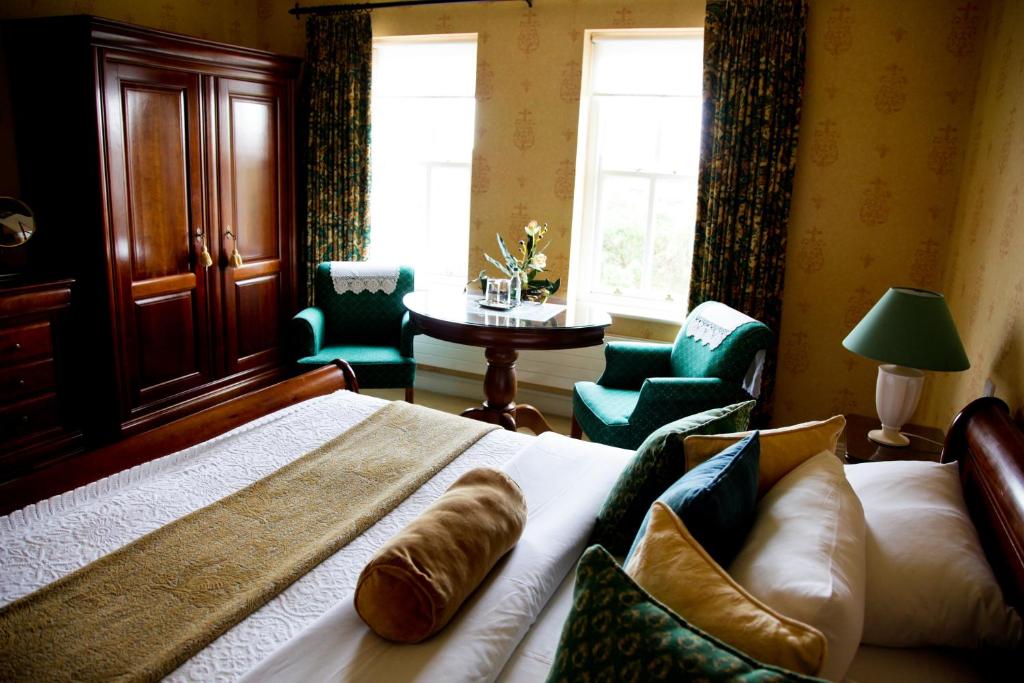 Postel nebo postele na pokoji v ubytování Ardmore Country House