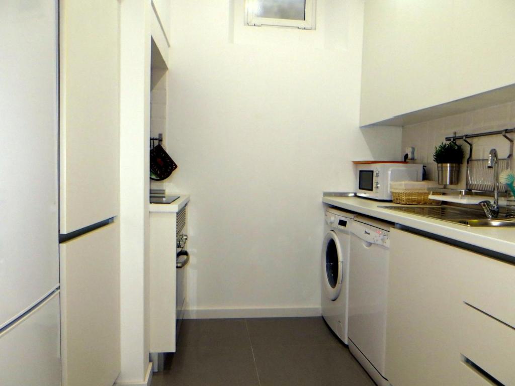 Kuchyň nebo kuchyňský kout v ubytování São Lázaro Lisbon Apartments