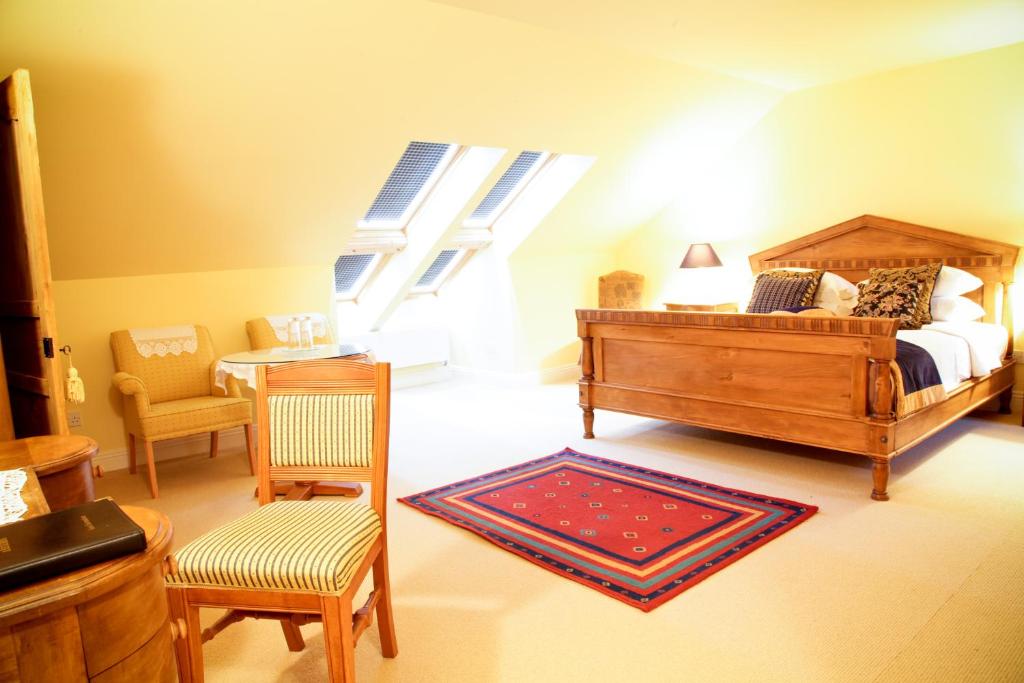 Postel nebo postele na pokoji v ubytování Ardmore Country House