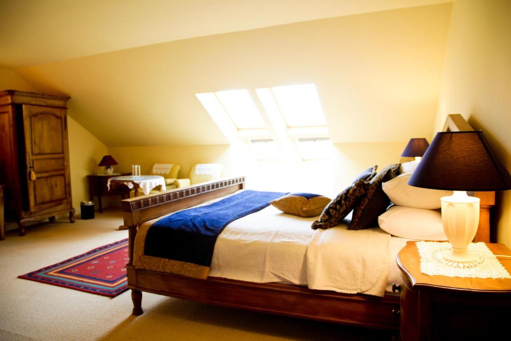 Postel nebo postele na pokoji v ubytování Ardmore Country House