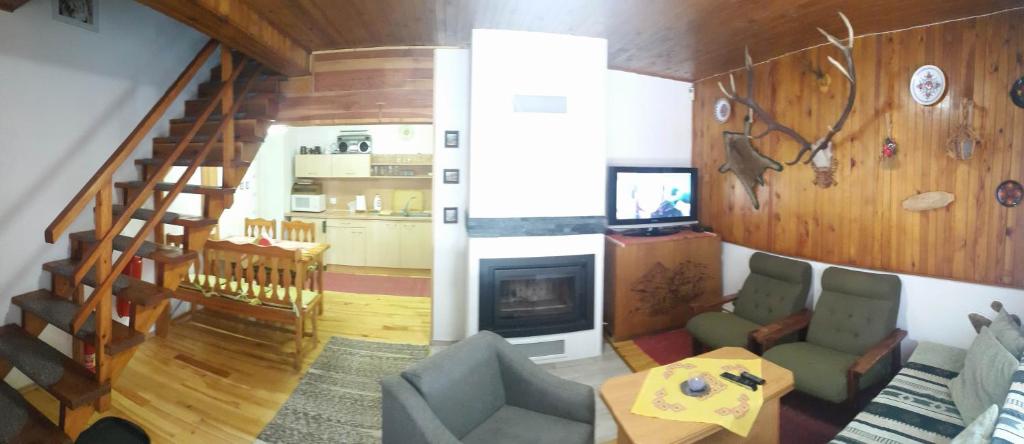A seating area at Chata Lucia