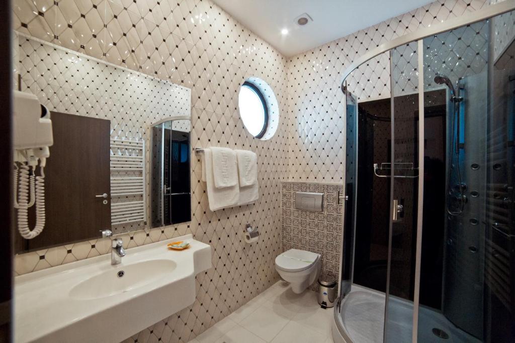 Koupelna v ubytování Hotel Evergreen