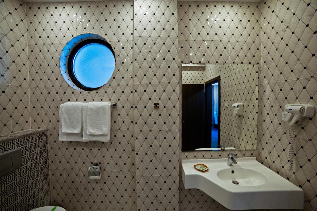 Koupelna v ubytování Hotel Evergreen