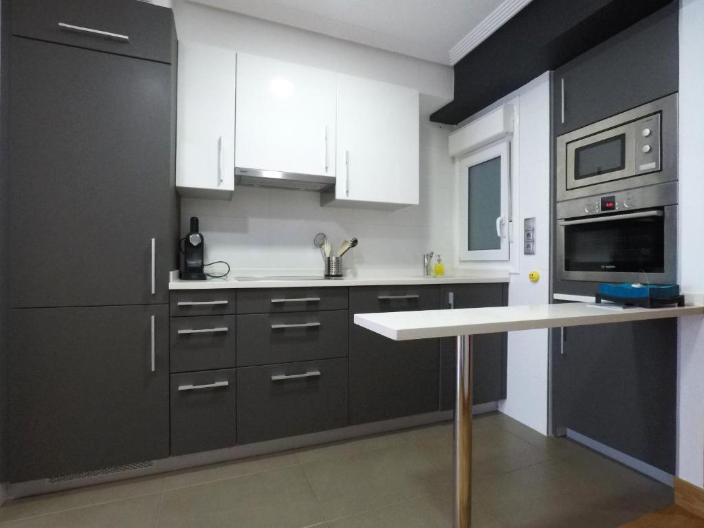Kuchyňa alebo kuchynka v ubytovaní Gros Beach Apartment