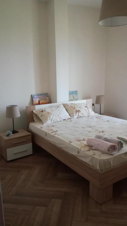 Postel nebo postele na pokoji v ubytování Villa Kalandra