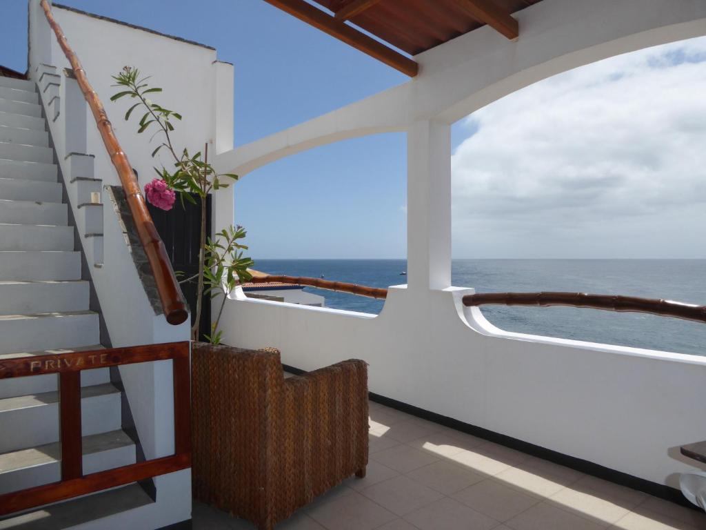 a balcony on a cruise ship looking out at the ocean at kasa Tambla in Ponta do Sol
