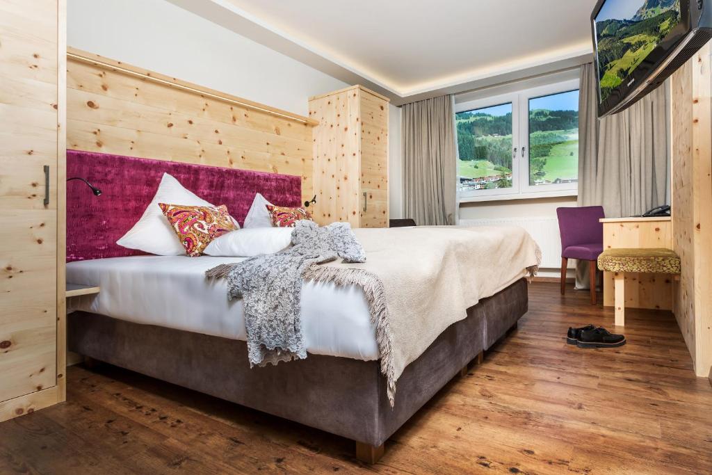 Postel nebo postele na pokoji v ubytování Hotel Talblick
