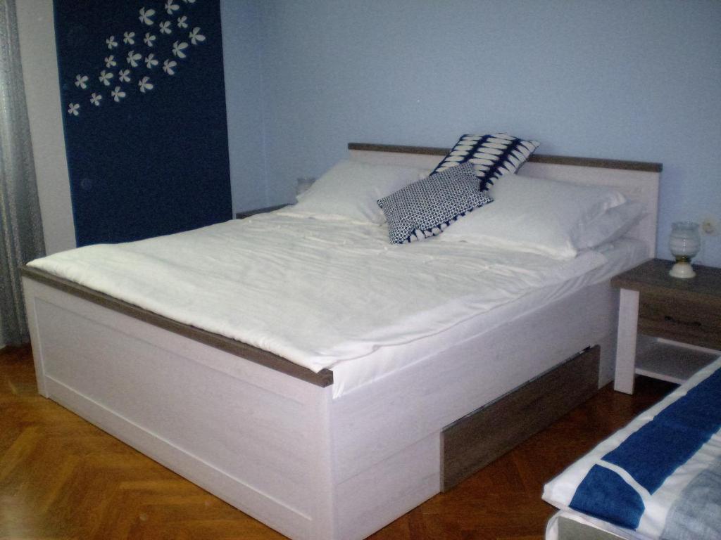 Postel nebo postele na pokoji v ubytování apartman pro 4 osoby