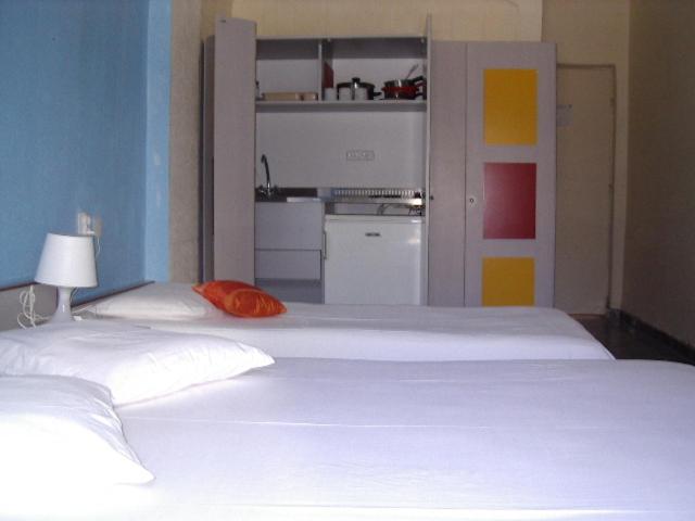 Postel nebo postele na pokoji v ubytování Hotel Dias Apartment