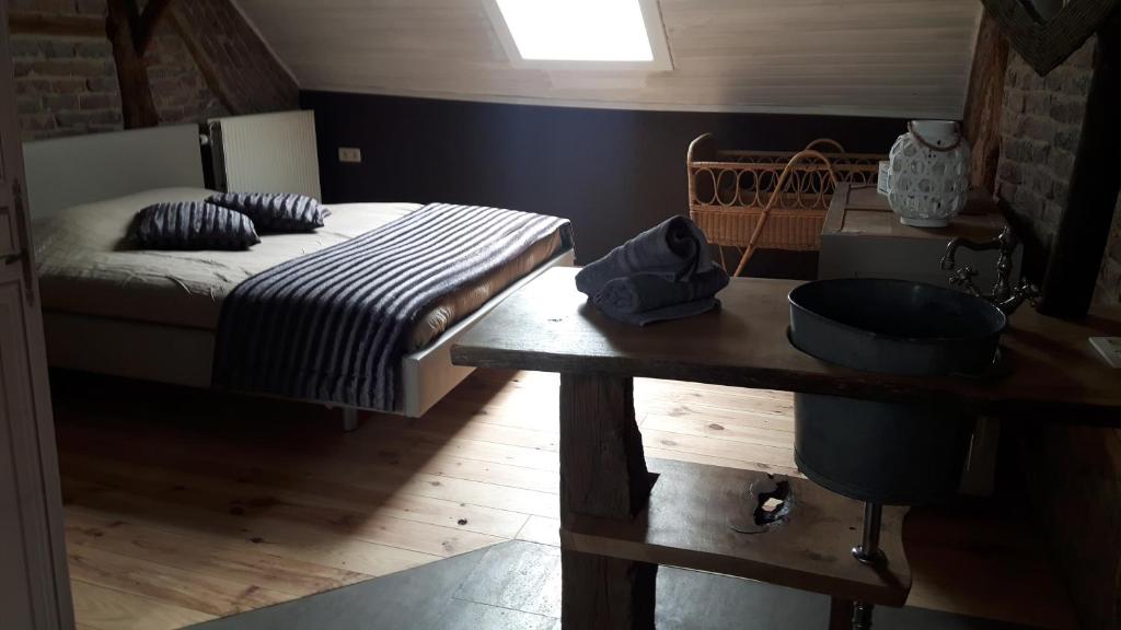 Postel nebo postele na pokoji v ubytování La Masure