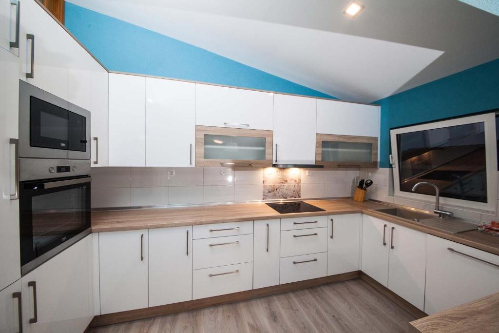 Kuchyň nebo kuchyňský kout v ubytování Apartman Josipa