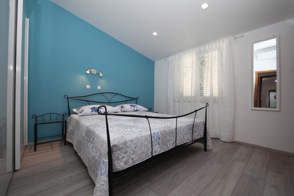 Postel nebo postele na pokoji v ubytování Apartman Josipa