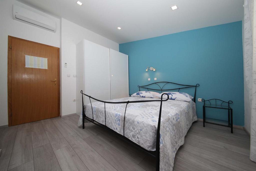 Postel nebo postele na pokoji v ubytování Apartman Josipa