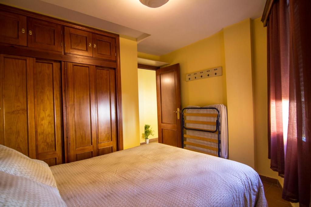 Posteľ alebo postele v izbe v ubytovaní Apartamento Cielo 35