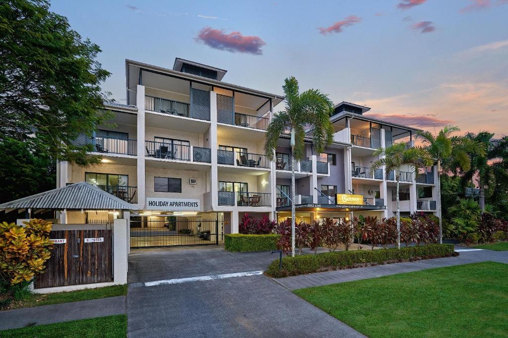 an exterior view of a large apartment building at Getaway On Grafton in Cairns