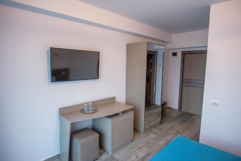 TV a/nebo společenská místnost v ubytování Belleview Suites