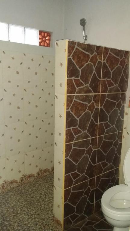 Koupelna v ubytování Jaswan Inn Borobudur