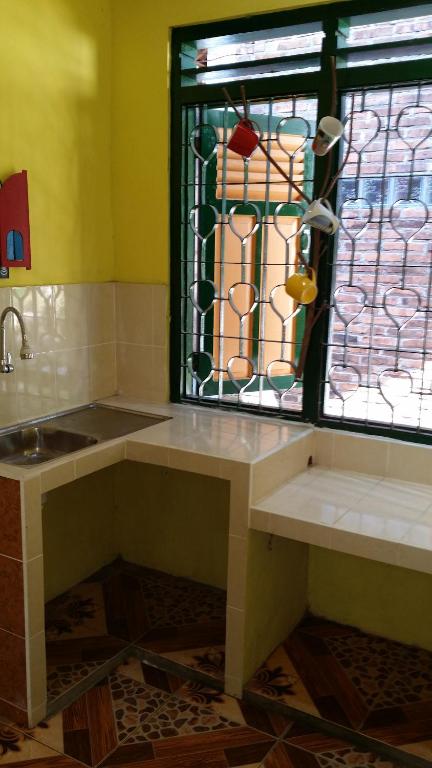 Kuchyň nebo kuchyňský kout v ubytování Jaswan Inn Borobudur
