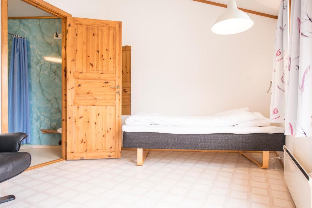 Postel nebo postele na pokoji v ubytování Berkåk Gjestegård