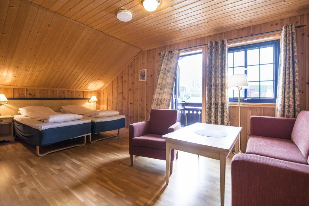 Postel nebo postele na pokoji v ubytování Berkåk Gjestegård