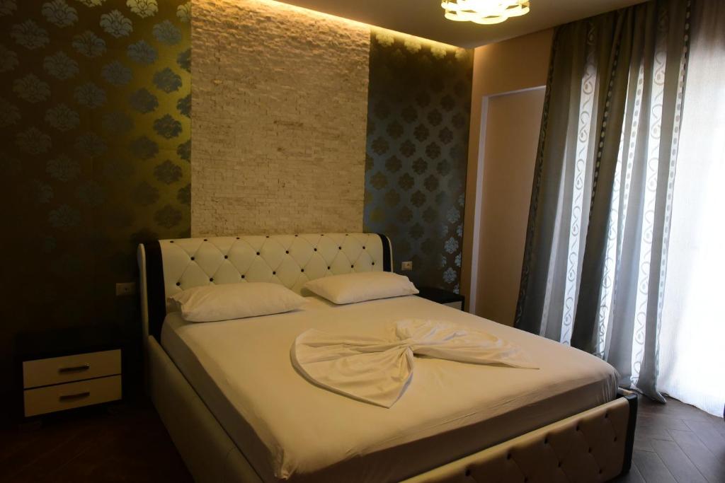 Postel nebo postele na pokoji v ubytování Villamaria Hotel