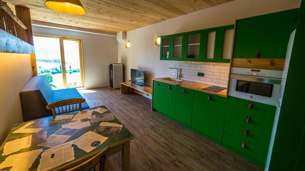 Kuchyňa alebo kuchynka v ubytovaní Casa Rural Cal Rossa de Taus SPA