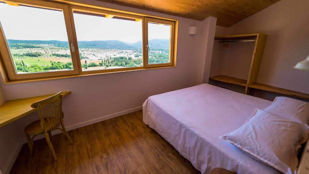 Posteľ alebo postele v izbe v ubytovaní Casa Rural Cal Rossa de Taus SPA