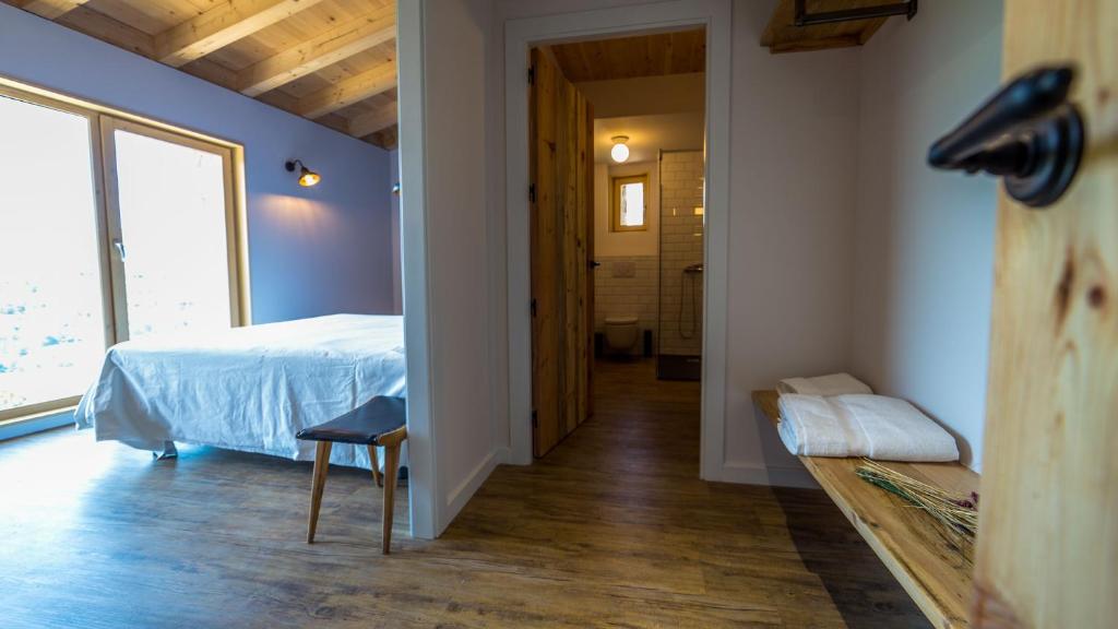 Posteľ alebo postele v izbe v ubytovaní Casa Rural Cal Rossa de Taus SPA