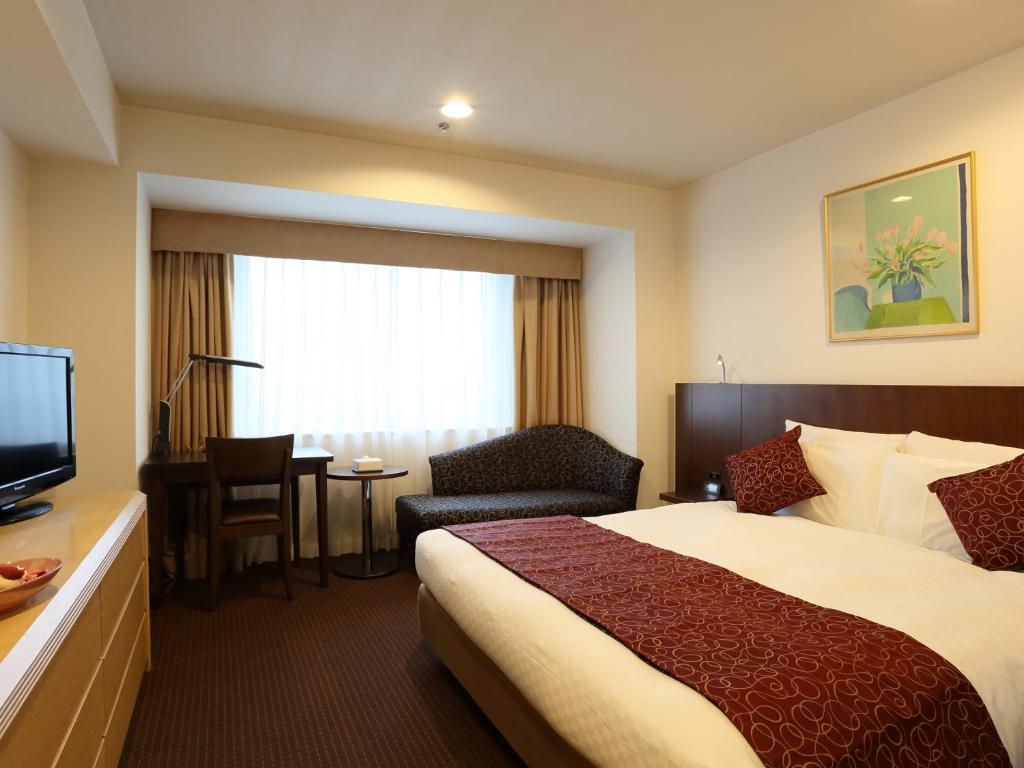 TV a/nebo společenská místnost v ubytování Loisir Hotel Toyohashi