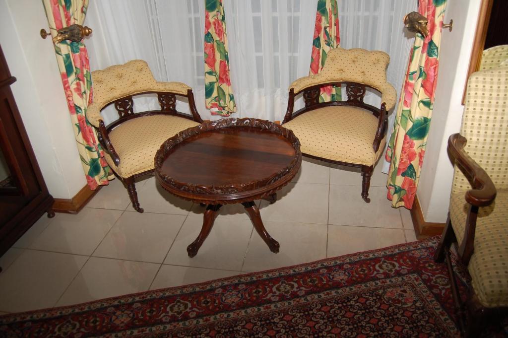 Posezení v ubytování Falcon Crest Suites