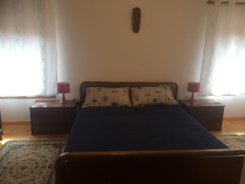 מיטה או מיטות בחדר ב-Casa Vacanze alle Vergini