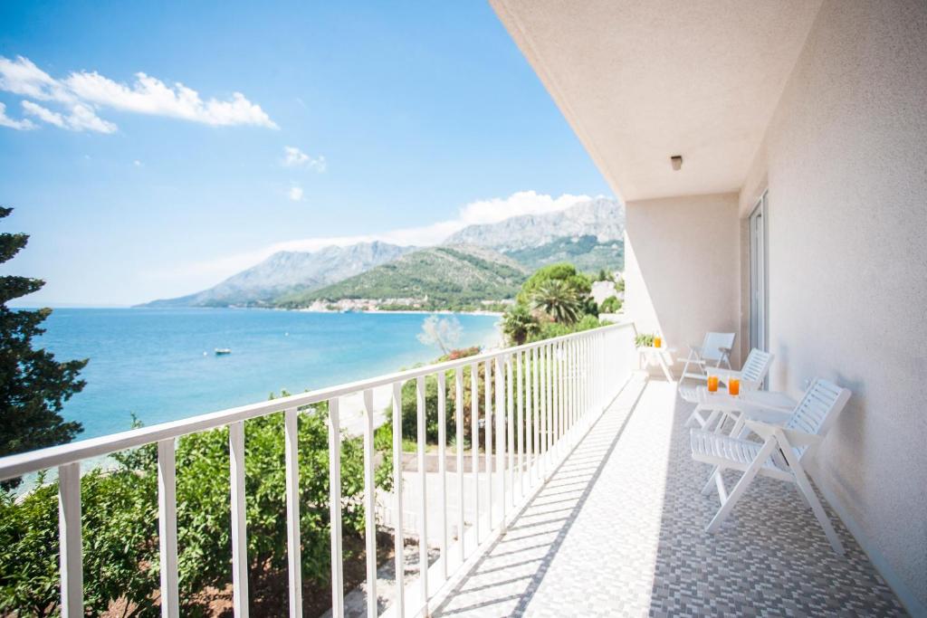 a balcony with a view of the ocean at Villa The Spot in Zaostrog