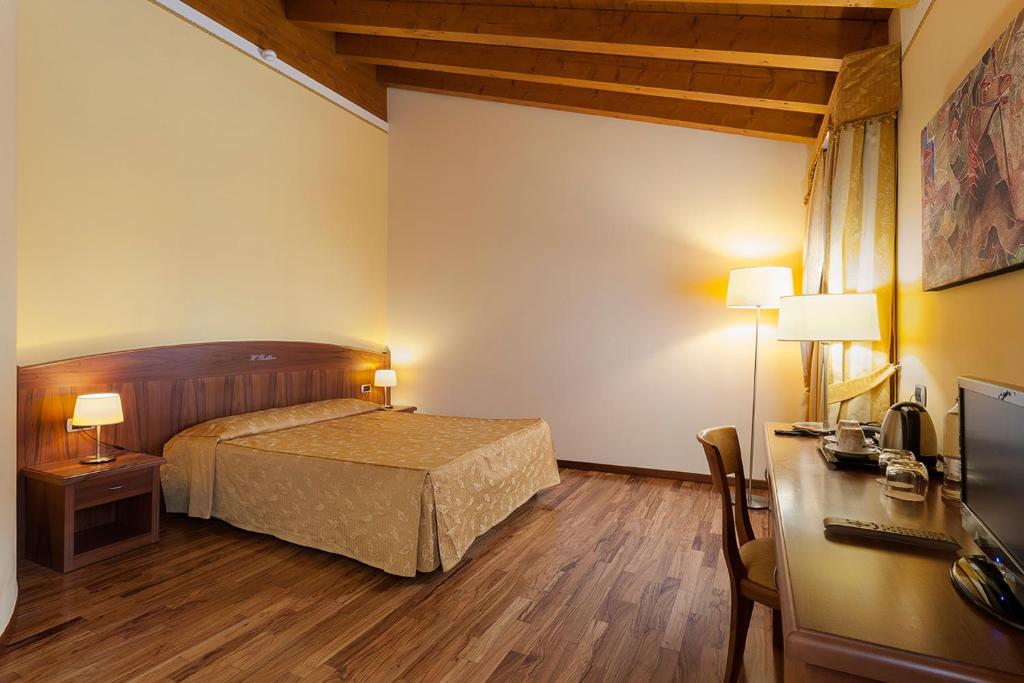 Postel nebo postele na pokoji v ubytování Hotel Purlilium