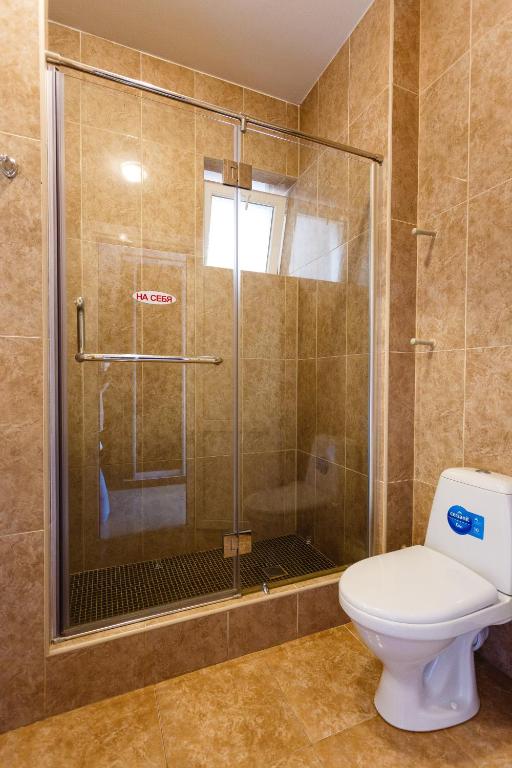Koupelna v ubytování VIP Hotel