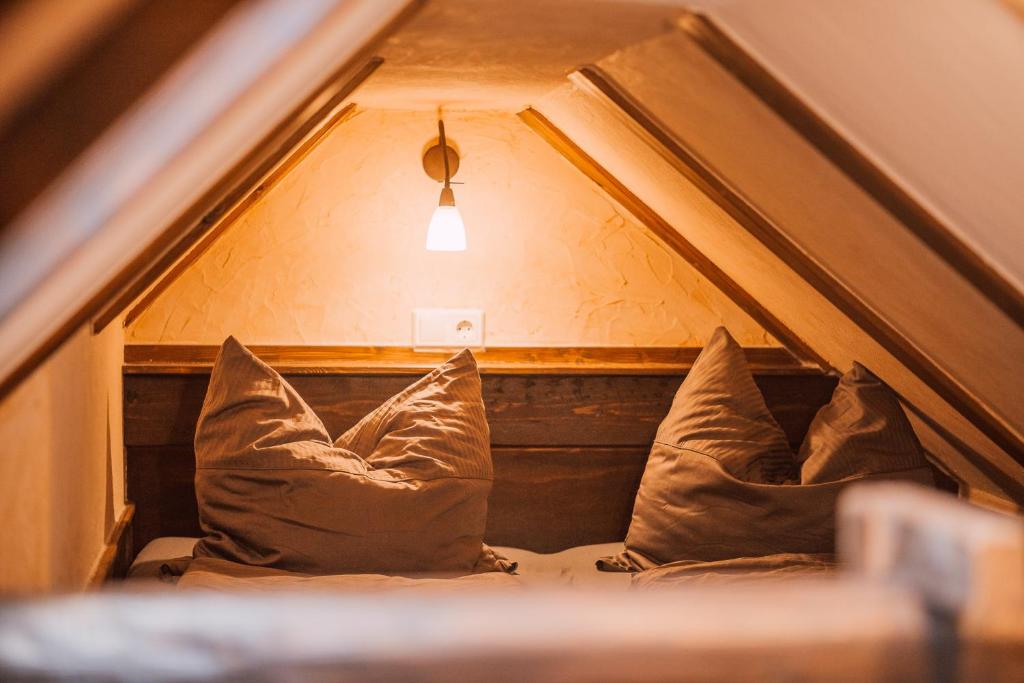 Postel nebo postele na pokoji v ubytování Apartment Altes Hinterhäusel