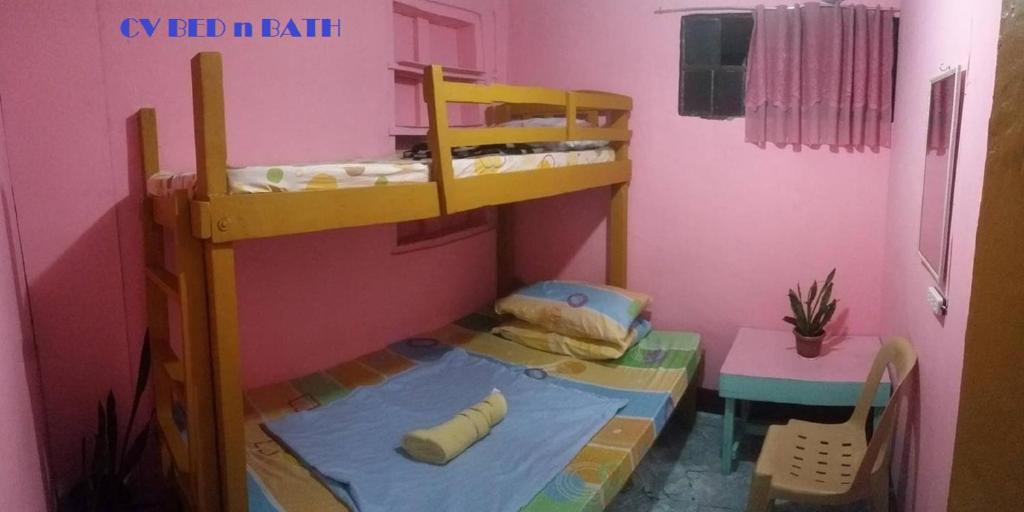 Postel nebo postele na pokoji v ubytování CV Bed n Bath