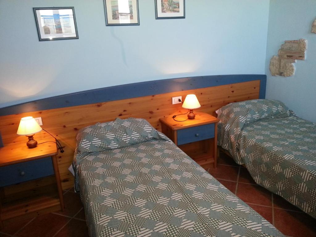 Postel nebo postele na pokoji v ubytování Borgo Beccanella