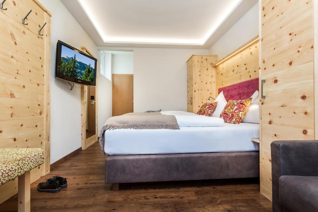 Postel nebo postele na pokoji v ubytování Hotel Talblick