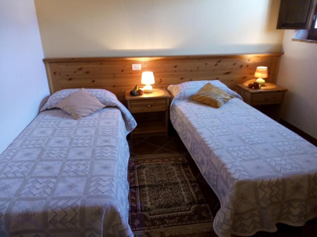 Postel nebo postele na pokoji v ubytování Borgo Beccanella