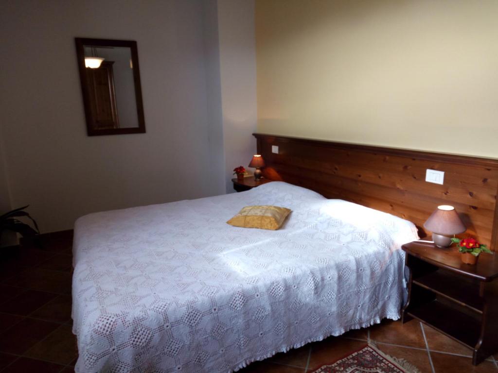 Postel nebo postele na pokoji v ubytování Borgo Beccanella