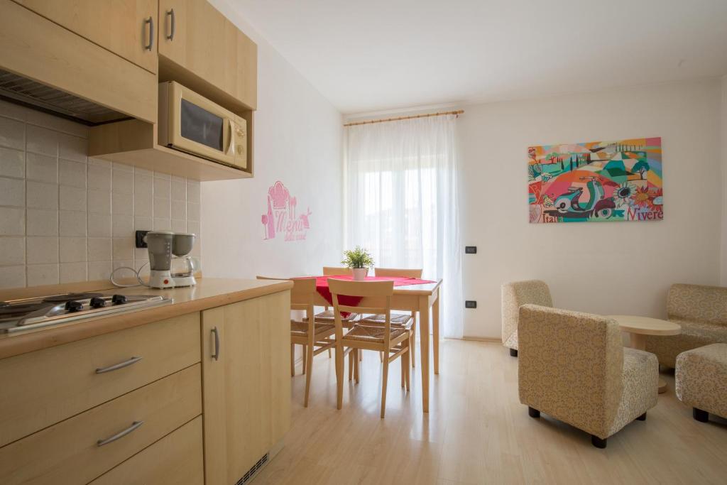 Kuchyň nebo kuchyňský kout v ubytování Hotel Da Remo