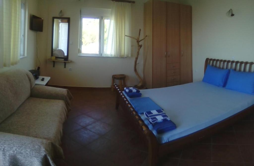 Postel nebo postele na pokoji v ubytování Kalivakia View