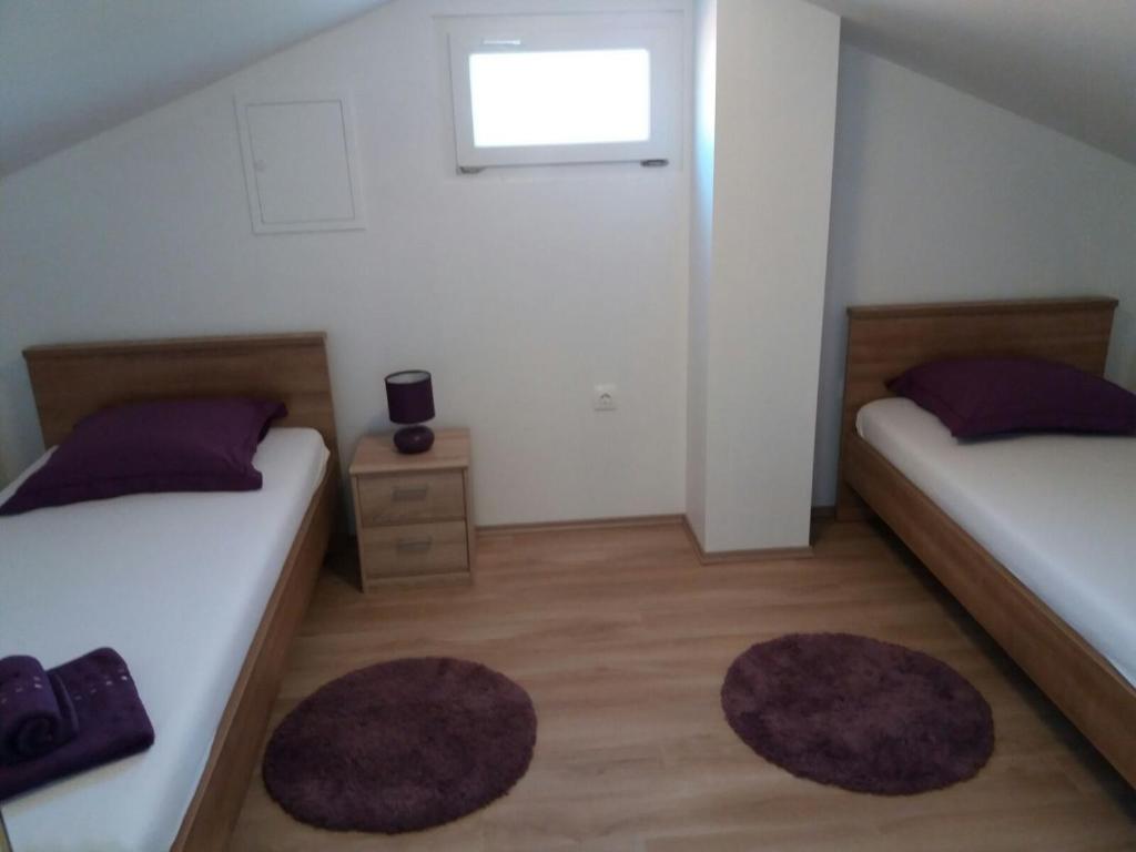 Postel nebo postele na pokoji v ubytování Apartment Marko
