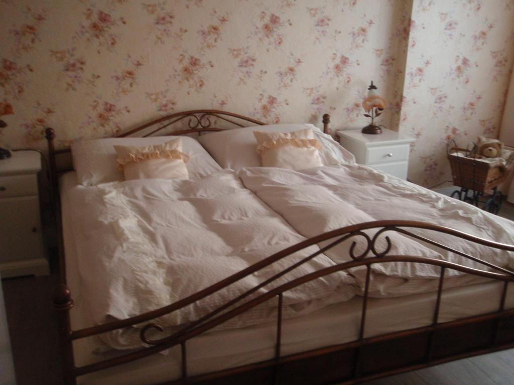 Postel nebo postele na pokoji v ubytování Apartmán Nostalgie