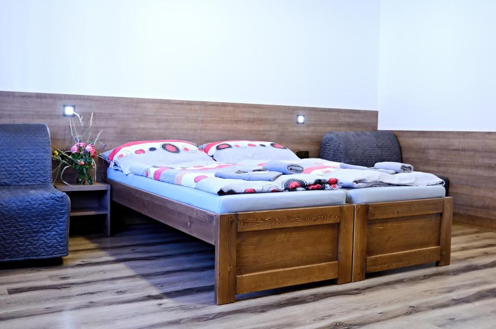 Postel nebo postele na pokoji v ubytování Penzion Prefila
