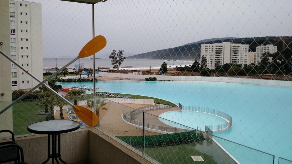 a view of a swimming pool from a building at Apartamento Papudo Laguna 511B in Papudo