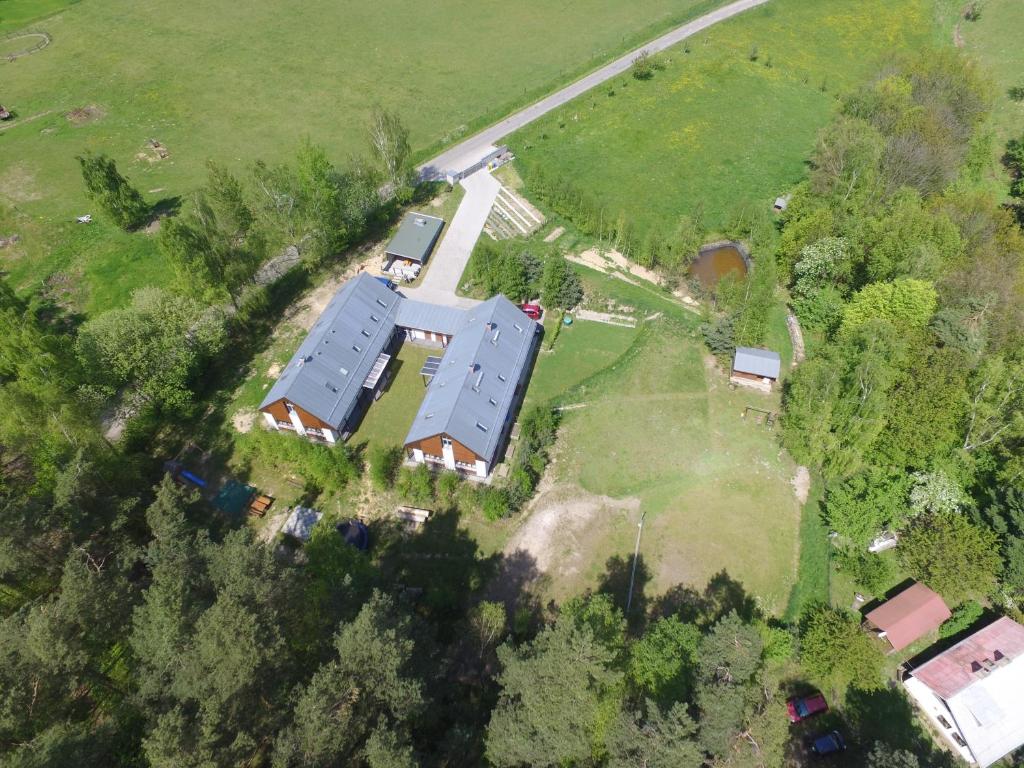 an aerial view of a house in a field at Penzion Na Pohoři in Olešnice